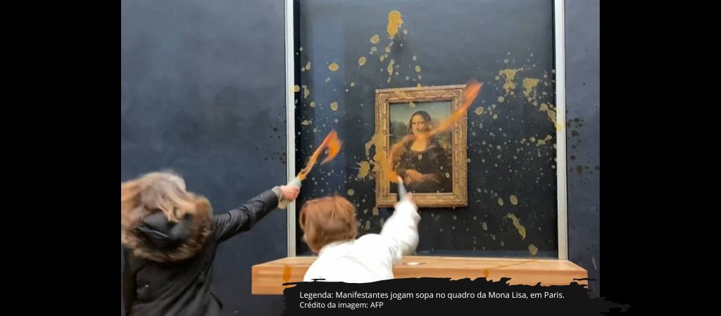 Manifestantes ativistas jogam sopa no quadro da Mona Lisa, em Paris.